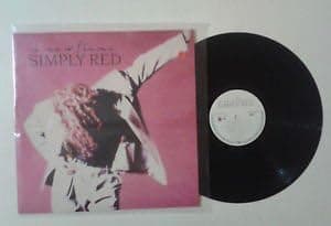 Simply Red "A new flame" LP WEA ELEKTRA 244689 1 WX 242 Germany 1989 por Simply Red — capa do álbum