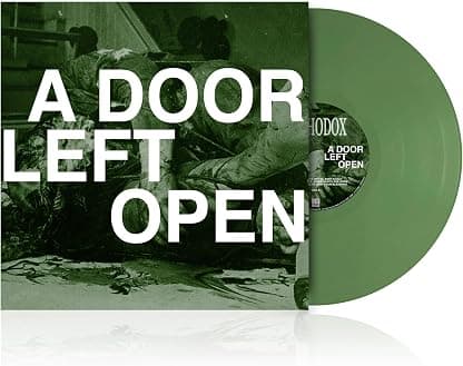 A Door Left Open por Orthodox — capa do álbum
