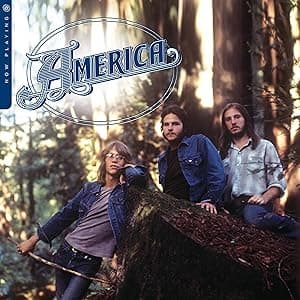 NOW PLAYING por America — capa do álbum
