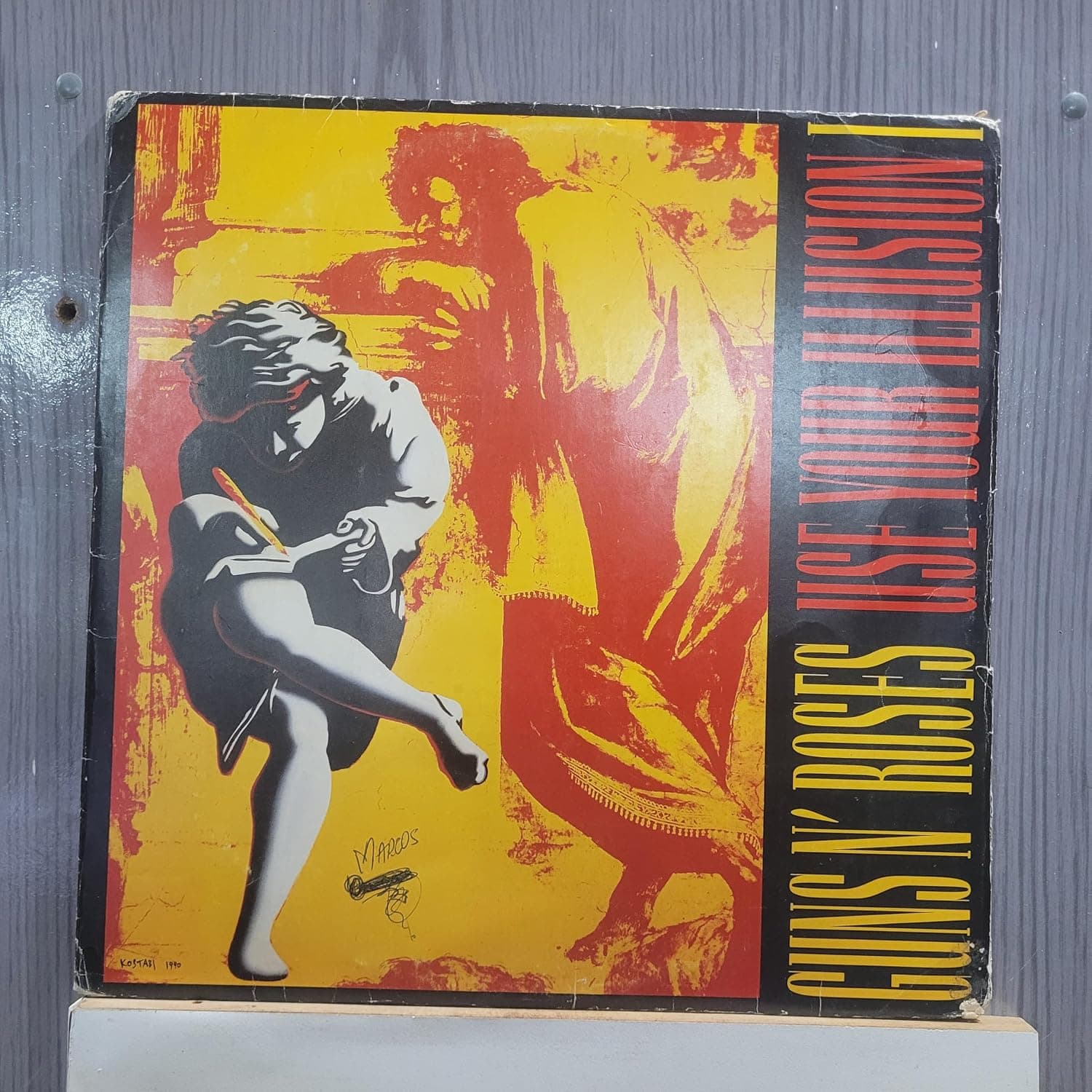 LP USE YOUR ILLUSION I (NAC) (DUPLO) por Guns N Roses — capa do álbum