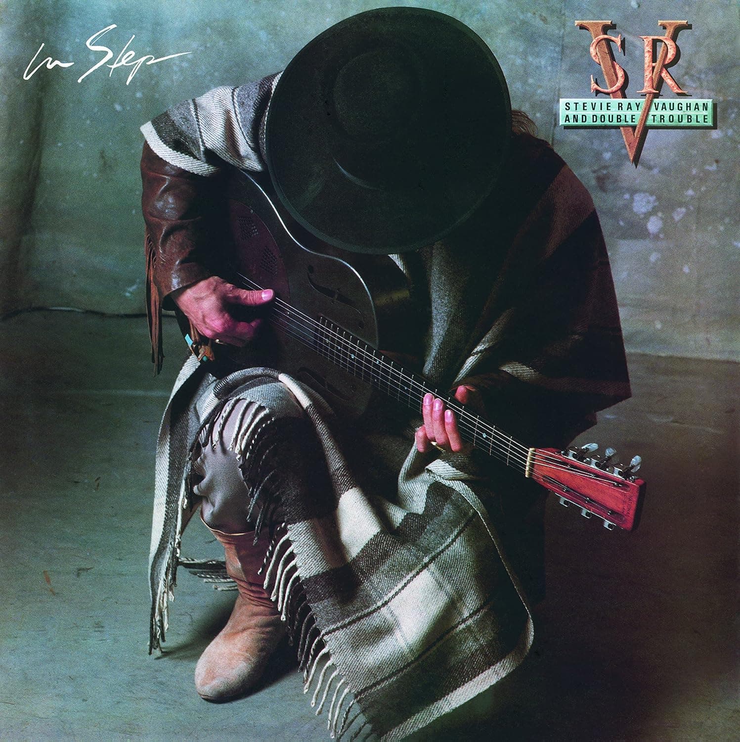 In Step por Stevie Ray Vaughan — capa do álbum